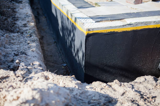 Professional Interior Drainage System technician working in Forest Lake, MN